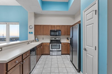 Set on Navarre Beach's iconic shoreline, Unit 105 at The Inn at