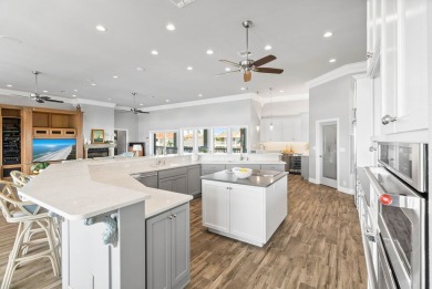 This extraordinary waterfront estate spans over 4,300 sq. ft. of