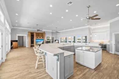 This extraordinary waterfront estate spans over 4,300 sq. ft. of