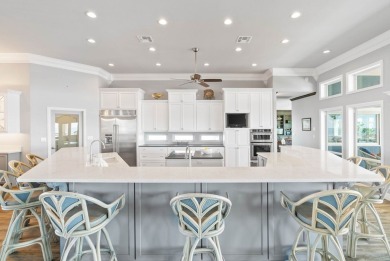 This extraordinary waterfront estate spans over 4,300 sq. ft. of