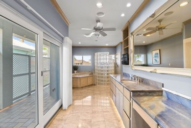 This extraordinary waterfront estate spans over 4,300 sq. ft. of