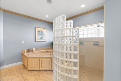 This extraordinary waterfront estate spans over 4,300 sq. ft. of