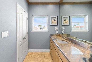 This extraordinary waterfront estate spans over 4,300 sq. ft. of