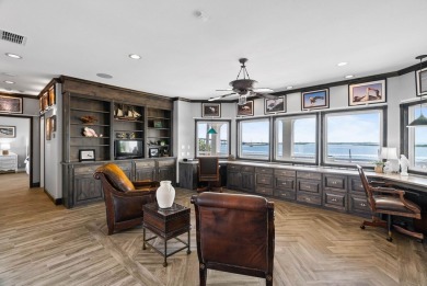 This extraordinary waterfront estate spans over 4,300 sq. ft. of