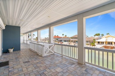 This extraordinary waterfront estate spans over 4,300 sq. ft. of