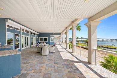 This extraordinary waterfront estate spans over 4,300 sq. ft. of