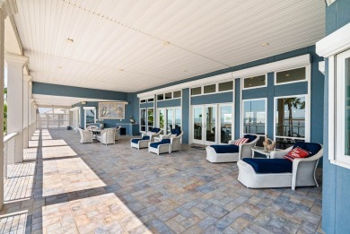 This extraordinary waterfront estate spans over 4,300 sq. ft. of