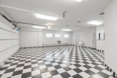 This extraordinary waterfront estate spans over 4,300 sq. ft. of