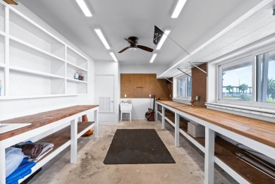 This extraordinary waterfront estate spans over 4,300 sq. ft. of