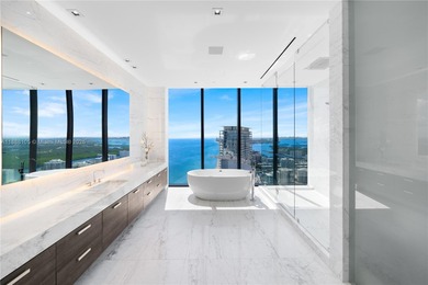 FULL-FLOOR DESIGNER OCEANFRONT LOWER PENTHOUSE WITH UNOBSTRUCTED