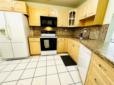 Welcome to North Miami Beach! This spacious residence places you