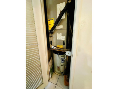 Welcome to North Miami Beach! This spacious residence places you