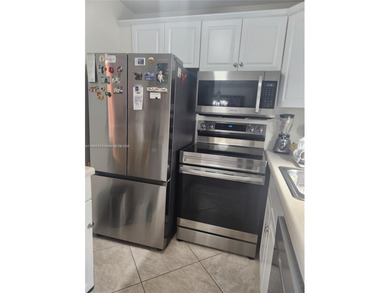 RENOVATED, A GREAT DEAL! 2ND FLOOR UNIT WITH MAGNIFICENT LAKE