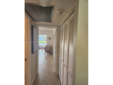 RENOVATED, A GREAT DEAL! 2ND FLOOR UNIT WITH MAGNIFICENT LAKE