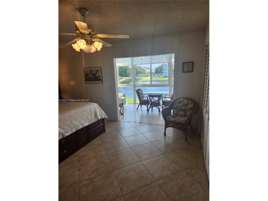 RENOVATED, A GREAT DEAL! 2ND FLOOR UNIT WITH MAGNIFICENT LAKE