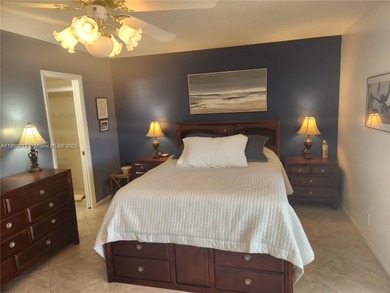 RENOVATED, A GREAT DEAL! 2ND FLOOR UNIT WITH MAGNIFICENT LAKE