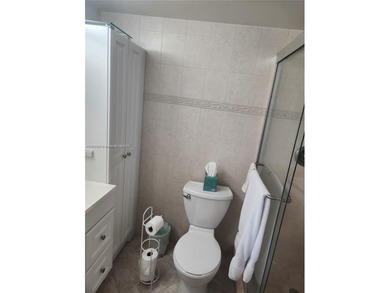 RENOVATED, A GREAT DEAL! 2ND FLOOR UNIT WITH MAGNIFICENT LAKE