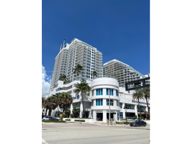 Welcome to Unit 1215 at The Q Club, a luxury condo-hotel