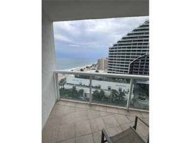 Welcome to Unit 1215 at The Q Club, a luxury condo-hotel