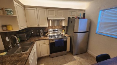 BEAUTIFULLY UPRADES 1200 SQ FT HOME IN THE MIDST OF ONE OF THE