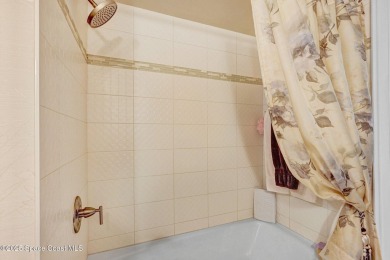 Welcome to your TURNKEY beachside slice of paradise! Lovely 2