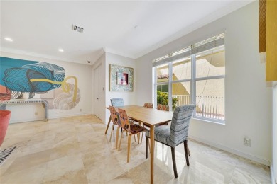 Experience the epitome of urban luxury in this 3-level townhome