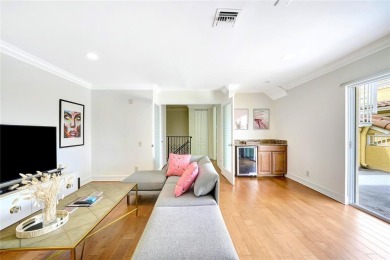 Experience the epitome of urban luxury in this 3-level townhome