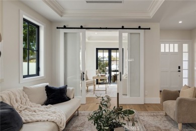 This newly constructed masterpiece in Manhattan Beach offers 6