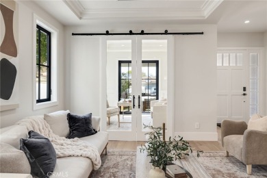 This newly constructed masterpiece in Manhattan Beach offers 6