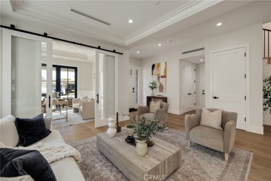 This newly constructed masterpiece in Manhattan Beach offers 6