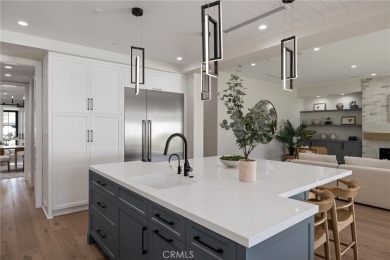 This newly constructed masterpiece in Manhattan Beach offers 6