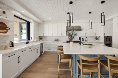 This newly constructed masterpiece in Manhattan Beach offers 6