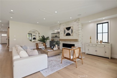 This newly constructed masterpiece in Manhattan Beach offers 6