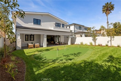 This newly constructed masterpiece in Manhattan Beach offers 6
