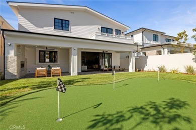 This newly constructed masterpiece in Manhattan Beach offers 6