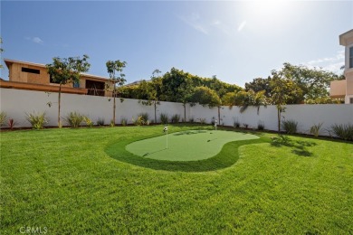 This newly constructed masterpiece in Manhattan Beach offers 6