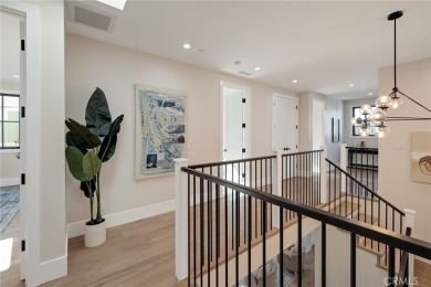 This newly constructed masterpiece in Manhattan Beach offers 6