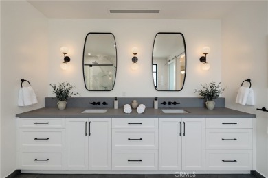 This newly constructed masterpiece in Manhattan Beach offers 6