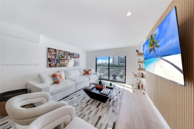 This impeccably renovated 2-bedroom, 2-bath residence offers 1