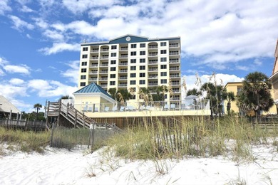 Experience the Emerald Coast at its best from this beautifully