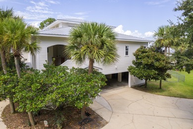 Live the dream in this spectacular Bay front oasis thoughtfully