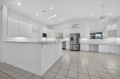 Live the dream in this spectacular Bay front oasis thoughtfully