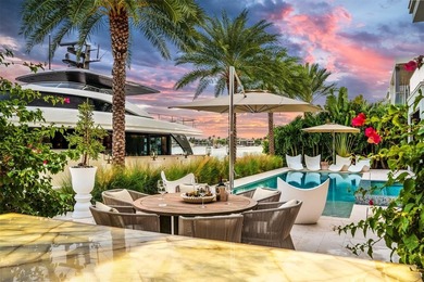 TIMELESS WATERFRONT MASTERPIECE IN EXCLUSIVE HARBOR BEACH! A