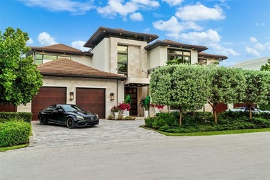 TIMELESS WATERFRONT MASTERPIECE IN EXCLUSIVE HARBOR BEACH! A