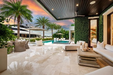 TIMELESS WATERFRONT MASTERPIECE IN EXCLUSIVE HARBOR BEACH! A