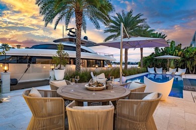 TIMELESS WATERFRONT MASTERPIECE IN EXCLUSIVE HARBOR BEACH! A