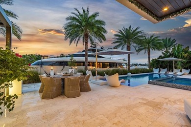 TIMELESS WATERFRONT MASTERPIECE IN EXCLUSIVE HARBOR BEACH! A