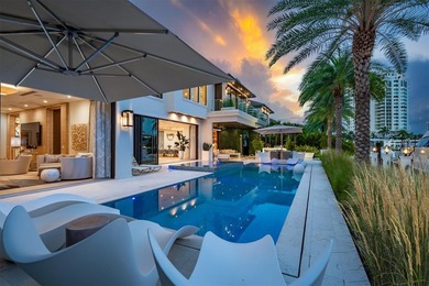 TIMELESS WATERFRONT MASTERPIECE IN EXCLUSIVE HARBOR BEACH! A