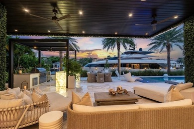 TIMELESS WATERFRONT MASTERPIECE IN EXCLUSIVE HARBOR BEACH! A