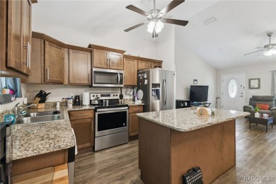 Tucked away on a VERY INTIMATE and ISOLATED.55-acre corner lot